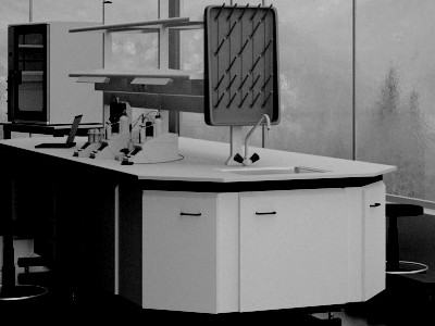 Na zdjęciu przedstawiono stół wyspowy z ociekaczem i baterią laboratoryjną