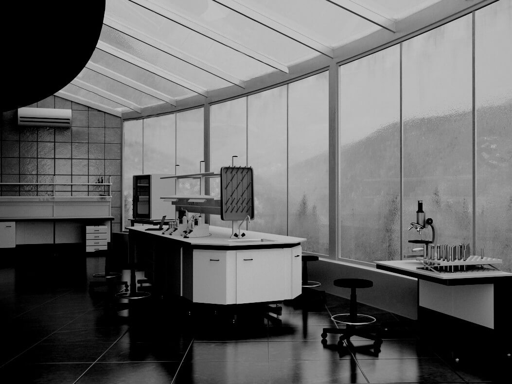 Na zdjęciu przdstawiono stół laboratoryjny wyspowy w kolorze białym oraz inne wyposażenie laboratoryjne